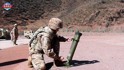 A PLA Army Tibet Military District soldier firing a QLG-10 under-barrel grenade launcher in February 2026
